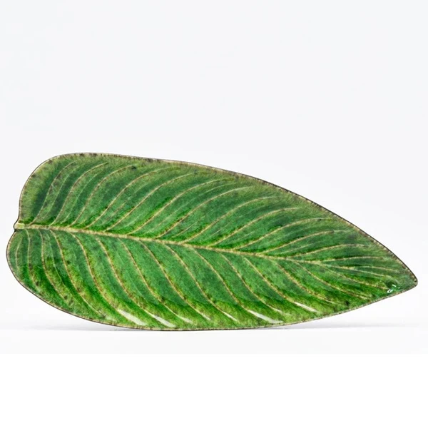 Feuille de Strelizia en grès vert par Christian TORTU