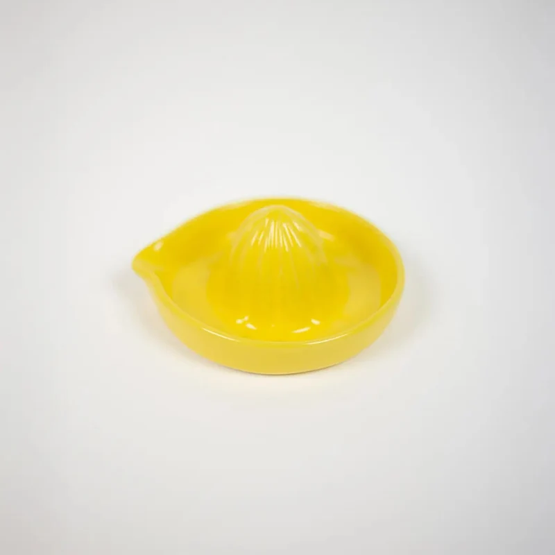 Presse-citron manuel en grès jaune
